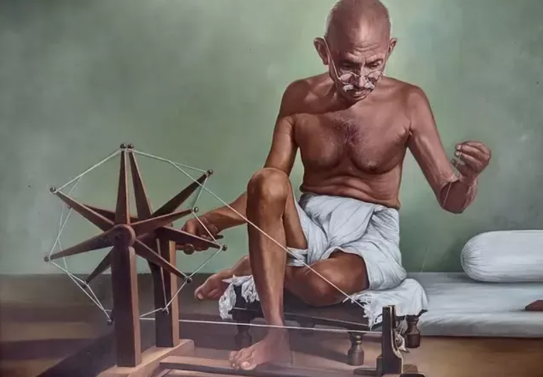 GANDHI WITH CHARKHA WEAPON