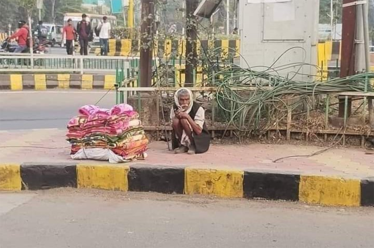 POOR PERSON ON FOOTHPATH