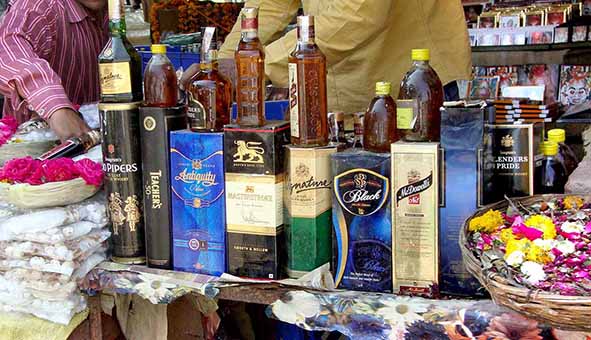 When and who originated liquor