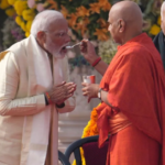 Narendra Modi drinking charanamrit from a spoon